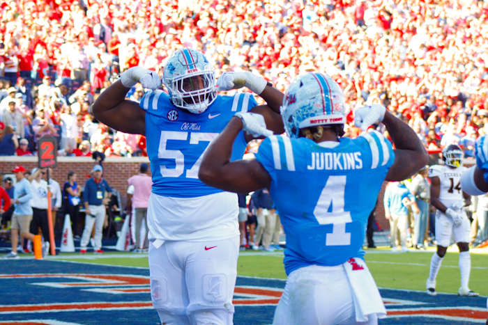 Ole Miss Rebels Quinshon Judkins (4) and Micah Pettus (57) celebrate a touchdown versus the Texas A&M Aggies (2023).